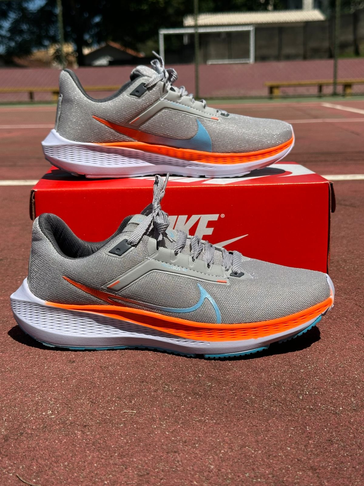 Tenis Vomero 17 Masculino Cinza/ Laranja